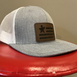 hat with logo on red stool